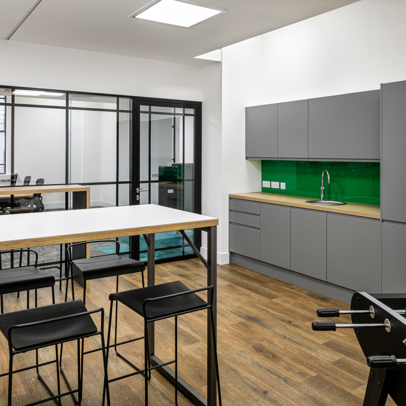 kitchen units high table with stools and football table