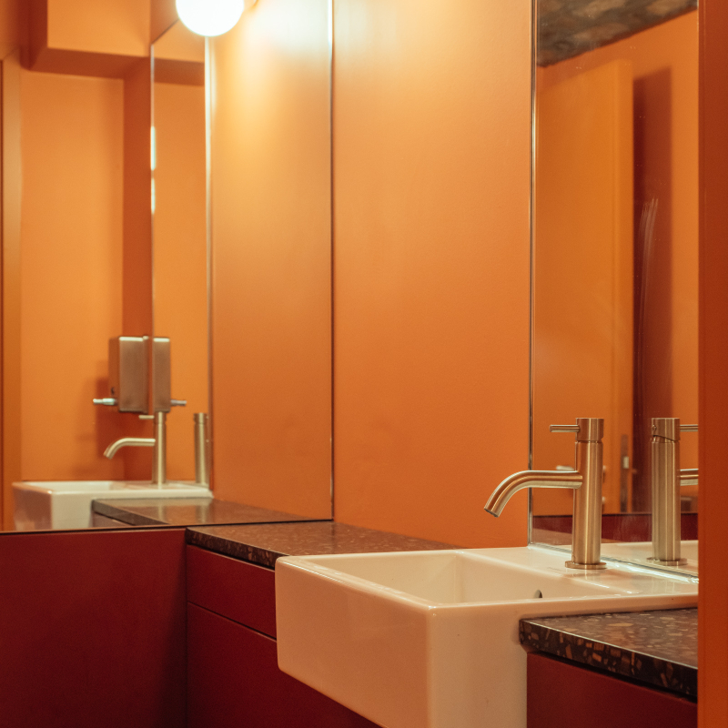 wash basin and shelf within the w/c