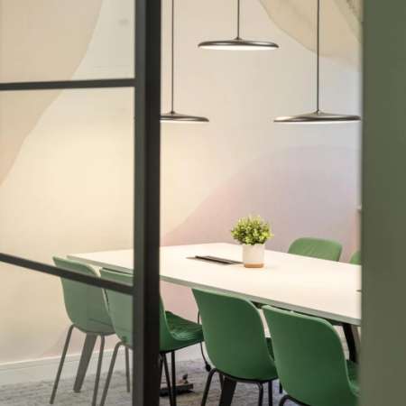 6 person meeting room with feature lighting and feature wallcoverings too